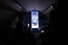 Journalists record a video inside a plane during a presentation of an aircraft dedicated to the late soccer legend Diego Maradona, at a military base in Moron, on the outskirts of Buenos Aires, Argentina, Wednesday, May 25, 2022. A ceremony was held before the airplane departs for different provinces of Argentina and other parts of the world reaching its final destination at the World Cup in Qatar at the end of the year. The aircraft, owned by a local business group, will carry and display jerseys and other objects that belonged to Maradona. It is one of the many tributes planned to coincide with the first World Cup since his death. (AP Photo/Rodrigo Abd)