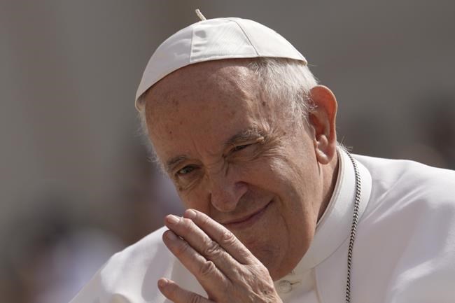 Pope Francis arrives to attend his weekly general audience in St. Peter's Square at the Vatican, Wednesday, June 22, 2022. The Vatican has released the program for Pope Francis' visit to Canada next month, which includes a visit to the site of a former residential school in Alberta with survivors of the institutions.(AP Photo/Andrew Medichini)