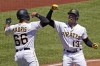 Pittsburgh Pirates' Ke'Bryan Hayes (13) celebrates with Bligh Madris after hitting a two-run home run off Chicago Cubs starting pitcher Justin Steele during the third inning of a baseball game in Pittsburgh, Thursday, June 23, 2022. (AP Photo/Gene J. Puskar)