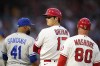 Los Angeles Angels' Shohei Ohtani (17) looks back while standing on first base during the third inning of a baseball game against the Kansas City Royals in Anaheim, Calif., Wednesday, June 22, 2022. (AP Photo/Ashley Landis)