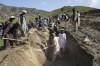 Afghans dig a trench for a common grave for their relatives killed in an earthquake to a buria site l in Gayan village, in Paktika province, Afghanistan, Thursday, June 23, 2022. Some Afghan-Canadians say they are worried Wednesday's magnitude 6 earthquake in eastern Afghanistan could heighten the country's already dire humanitarian crisis. THE CANADIAN PRESS/AP-Ebrahim Nooroozi