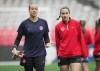Canada women's national soccer team goalkeeper Kailen Sheridan, left, and forward Evelyne Viens leave the field after team practice ahead of two friendly matches against Nigeria in Vancouver on Thursday, April 7, 2022. THE CANADIAN PRESS/Darryl Dyck