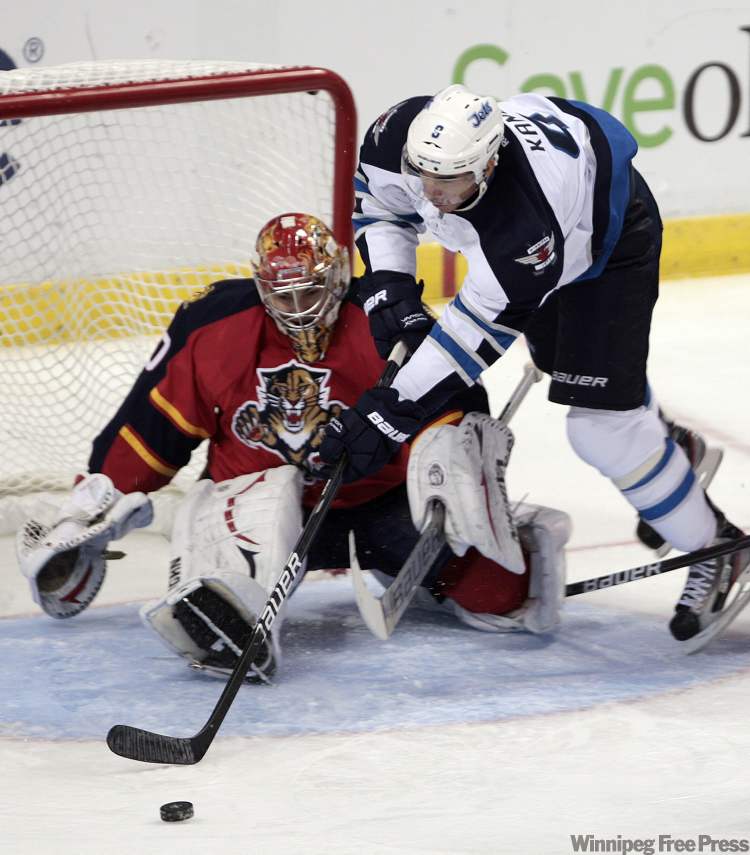 Alan Diaz / The Associated Press
Winnipeg Jets' Evander Kane (9) tries to score against Florida Panthers goalie Jose Theodore (60) in the second period of an NHL hockey game in Sunrise, Fla., Monday.