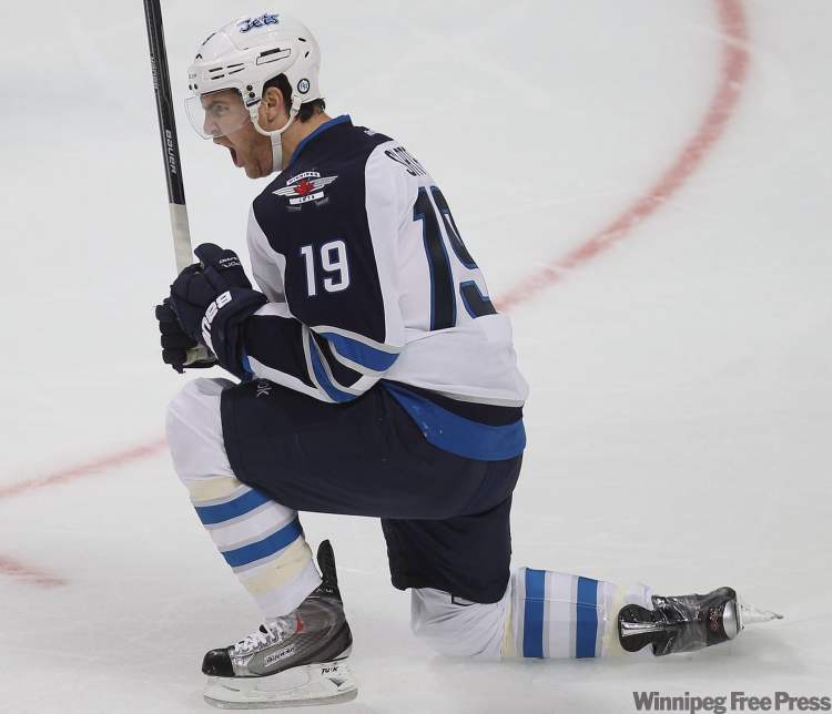 Winnipeg Jets' Jim Slater celebrates one of two first-period goals against the Chicago Blackhawks Thursday. (Joe Bryksa / Winnipeg Free Press)