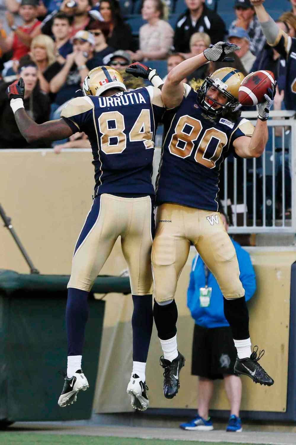 JOHN WOODS / WINNIPEG FREE PRESS
Bombers prospects Mario Urrutia, left, and Julian Feoli-Gudino celebrate Feoli-Gudino's first-half touchdown against the Argonauts.