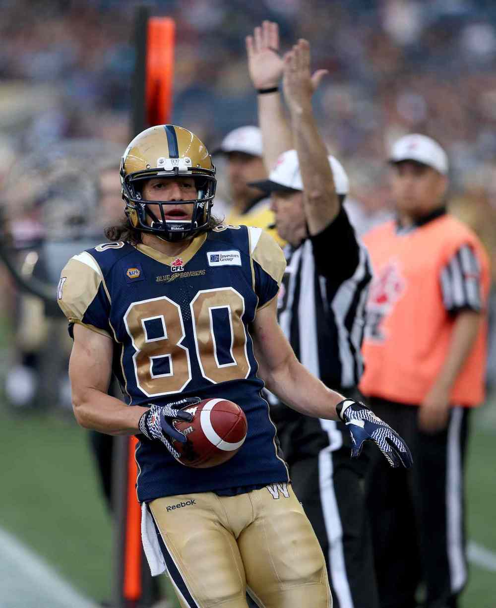 TREVOR HAGAN / THE CANADIAN PRESS
Winnipeg's Julian Feoli-Gudino scores a touchdown in the first half.