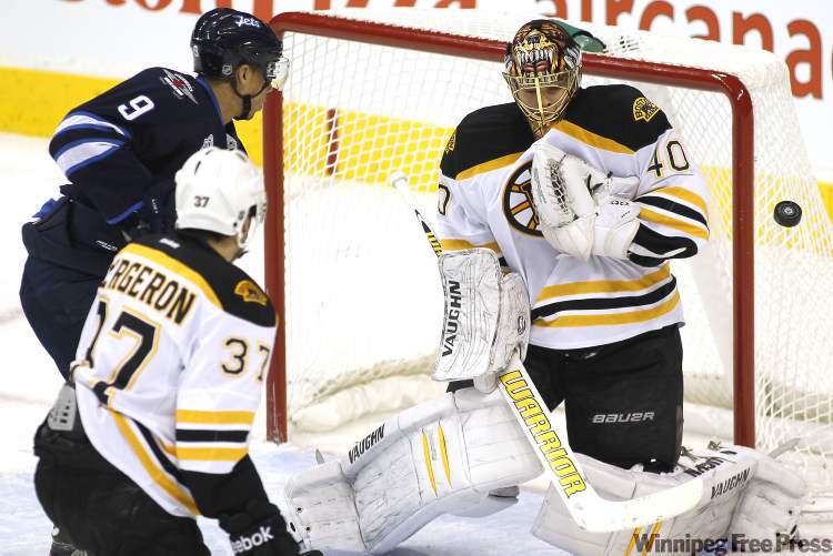 John Woods / Winnipeg Free Press
Boston Bruins' goaltender Tuukka Rask (40) stops Winnipeg Jets' forward Evander Kane's (9) shot during first-period NHL action in Winnipeg on Tuesday.
