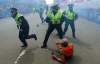 AP Photo / The Boston Globe, John Tlumacki
Police officers react to a second explosion at the finish line of the Boston Marathon in Boston, Monday, April 15, 2013.