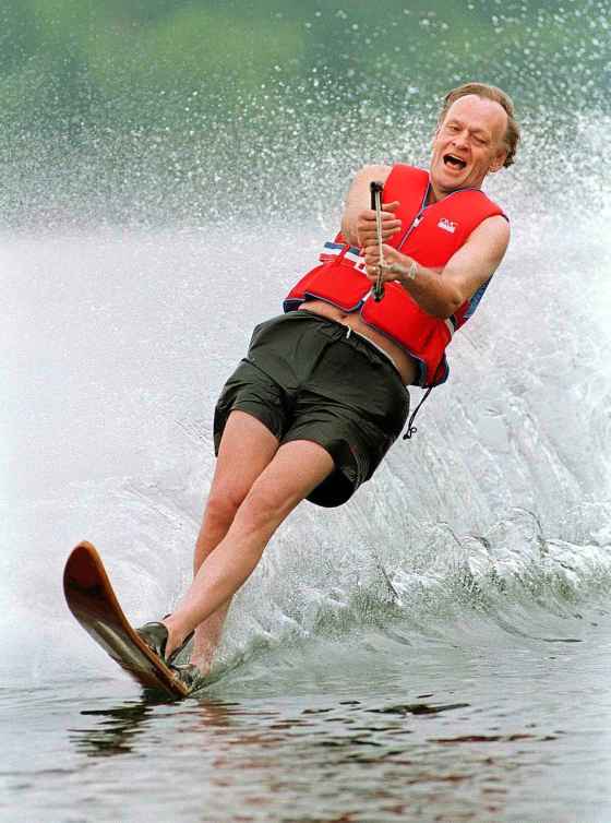 Jean Chrétien cuts through a wave while water-skiing near his cottage in Lac des Piles near Grand-Mere, Que. in 1993. (Ryan Remiorz / The Canadian Press files)