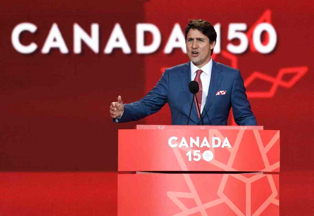 JUSTIN TANG / THE CANADIAN PRESS
Prime Minister Justin Trudeau speaks during the Canada Day noon hour show on Parliament Hill in Ottawa.