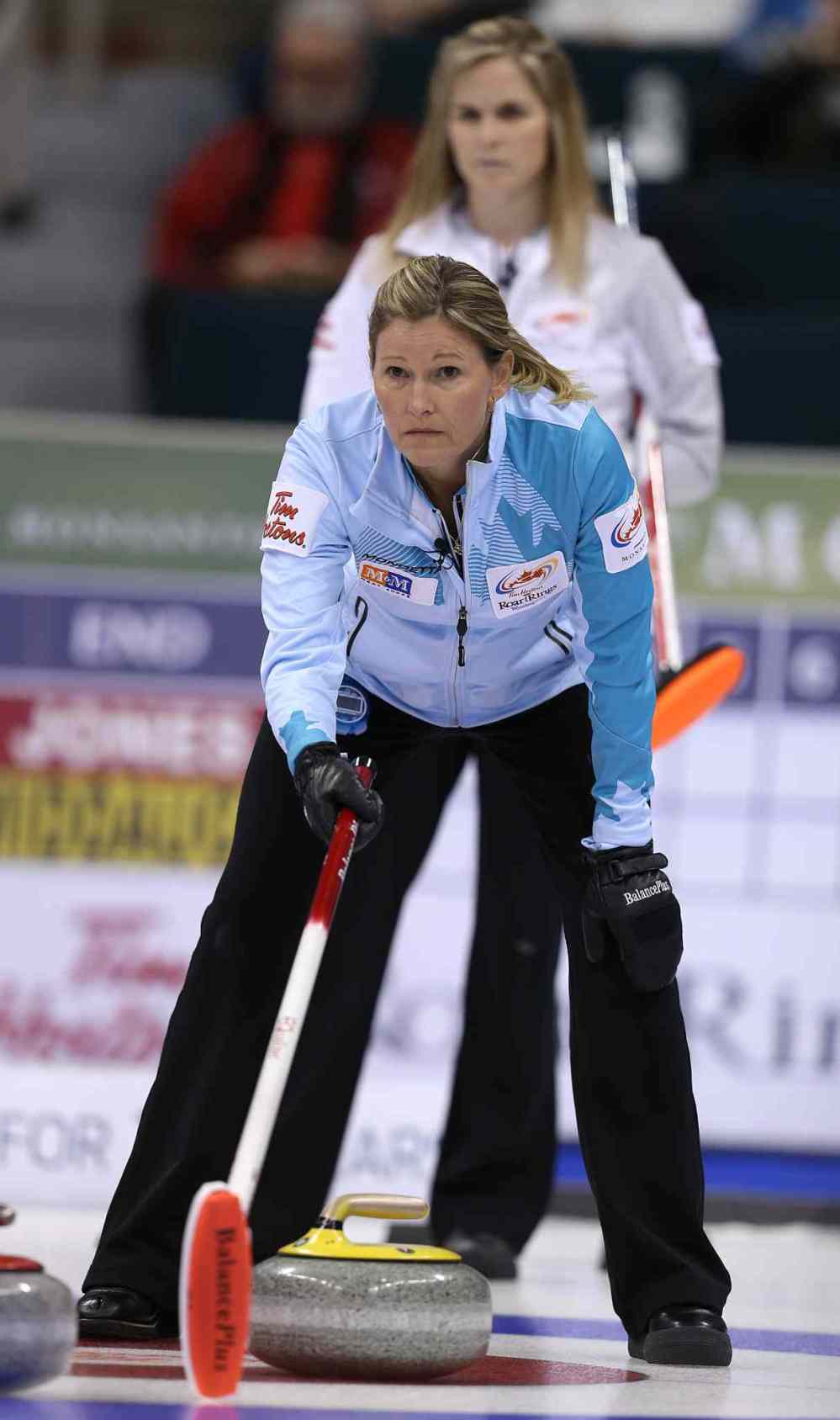 Jason Halstead / Winnipeg Free Press
Skip Sherry Middaugh (front) lines up a shot as Jennifer Jones watches.