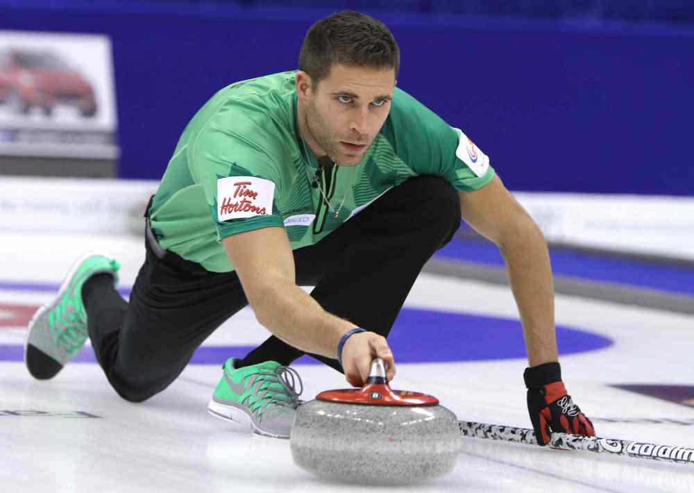 Jason Halstead / Winnipeg Free Press
Skip John Morris delivers a rock.
