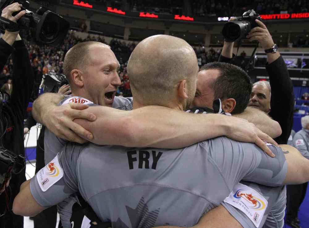 Jason Halstead / Winnipeg Free Press
Skip Brad Jacobs (left) and teammates celebrate after defeating the John Morris rink.