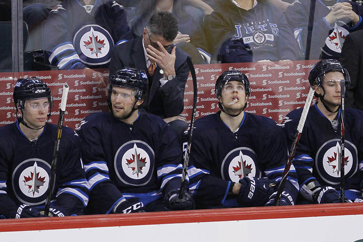 JOHN WOODS / The Canadian Press
Winnipeg Jets' head coach Claude Noel bows his head in disappointment during the third period.