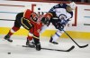 Jeff McIntosh / THE CANADIAN PRESS
Winnipeg Jets' Michael Frolik battles with Calgary Flames' Devin Setoguchi during first period NHL pre-season hockey action in Calgary Thursday.