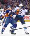 Jason Franson / The Canadian Press
Winnipeg Jets' Evander Kane (9) and Edmonton Oilers' Andrew Ference (21) battle during first period NHL hockey action in Edmonton, Alta., on Monday.