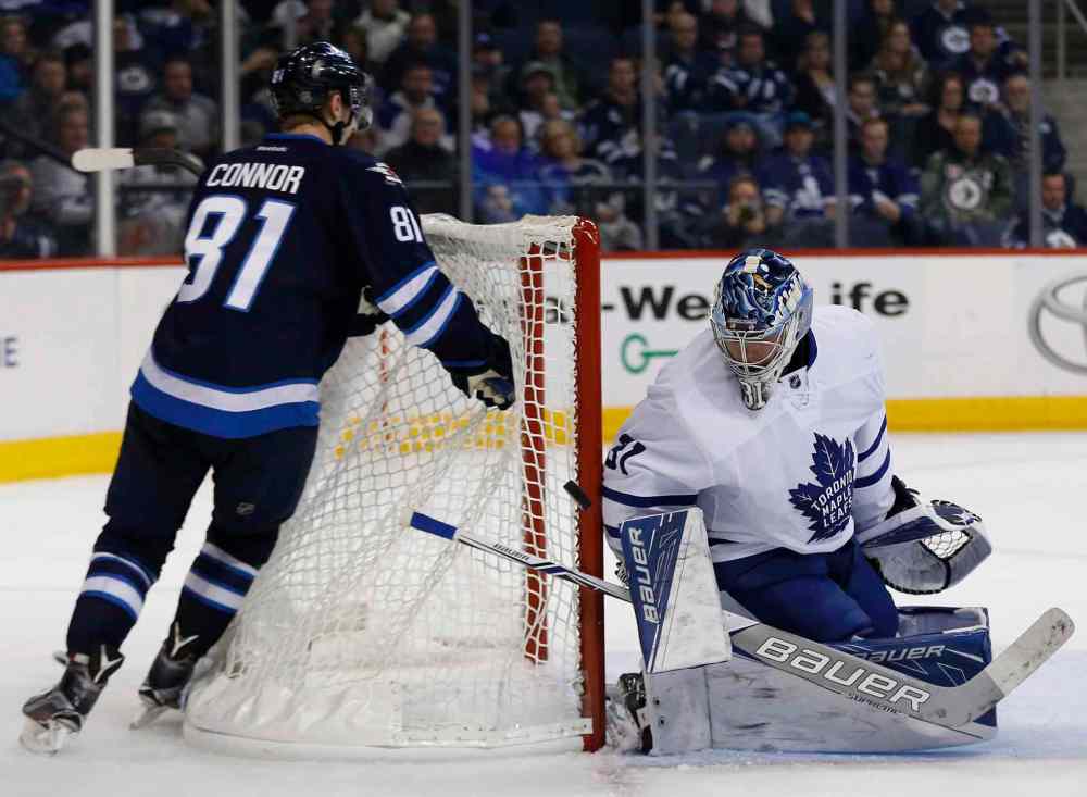 JOHN WOODS / THE CANADIAN PRESS
Toronto Maple Leafs goaltender Frederik Andersen (31) saves the shot by Winnipeg Jets' Kyle Connor (81) during second period NHL action in Winnipeg on Wednesday, October 19, 2016.