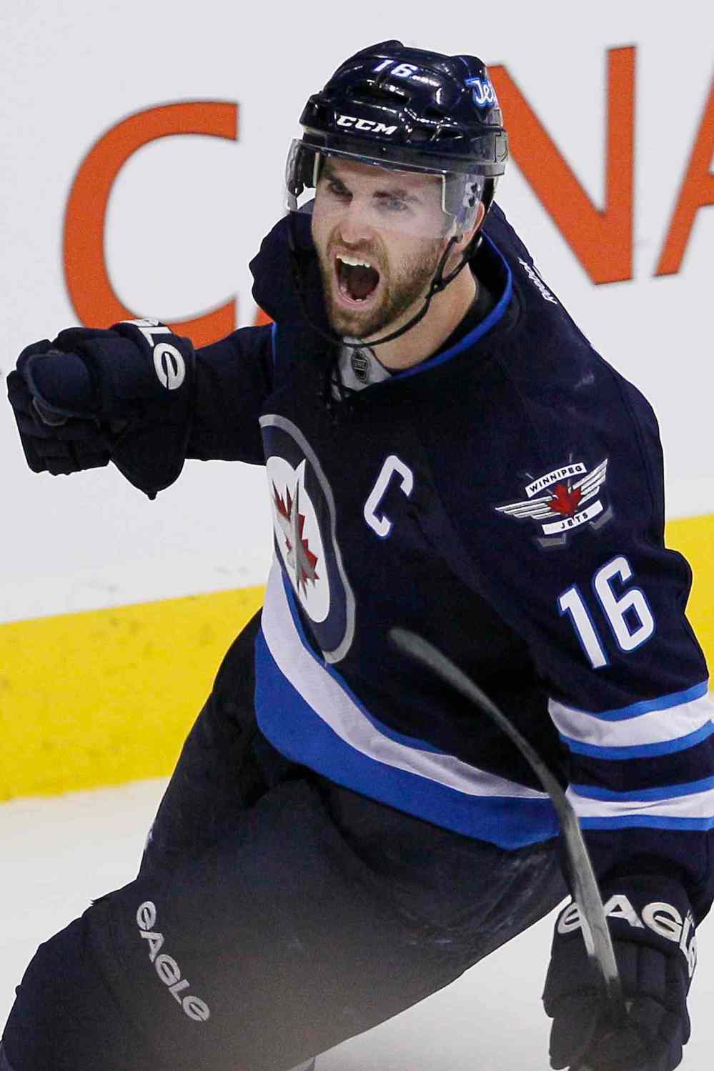 JOHN WOODS / THE CANADIAN PRESS
Andrew Ladd celebrates his shootout goal.