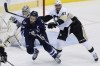 John Woods / THE CANADIAN PRESS
Pittsburgh Penguins' Robert Bortuzzo (41) clears Winnipeg Jets' Andrew Ladd (16) from in front of Penguins goaltender Marc-Andre Fleury (29) during first period NHL action in Winnipeg on Thursday.