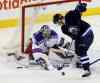 Trevor Hagan / The Canadian Press 
New York Rangers goaltender Henrik Lundqvist (30) stops Winnipeg Jets' Jacob Trouba (8) during first period NHL hockey action in Winnipeg, Friday night.