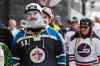 CP
Fans get in the playoff spirit at the Winnipeg Jets White Out Street Party prior to game one of the playoff series against Minnesota Wild Wednesday, April 11, 2018. THE CANADIAN PRESS/John Woods