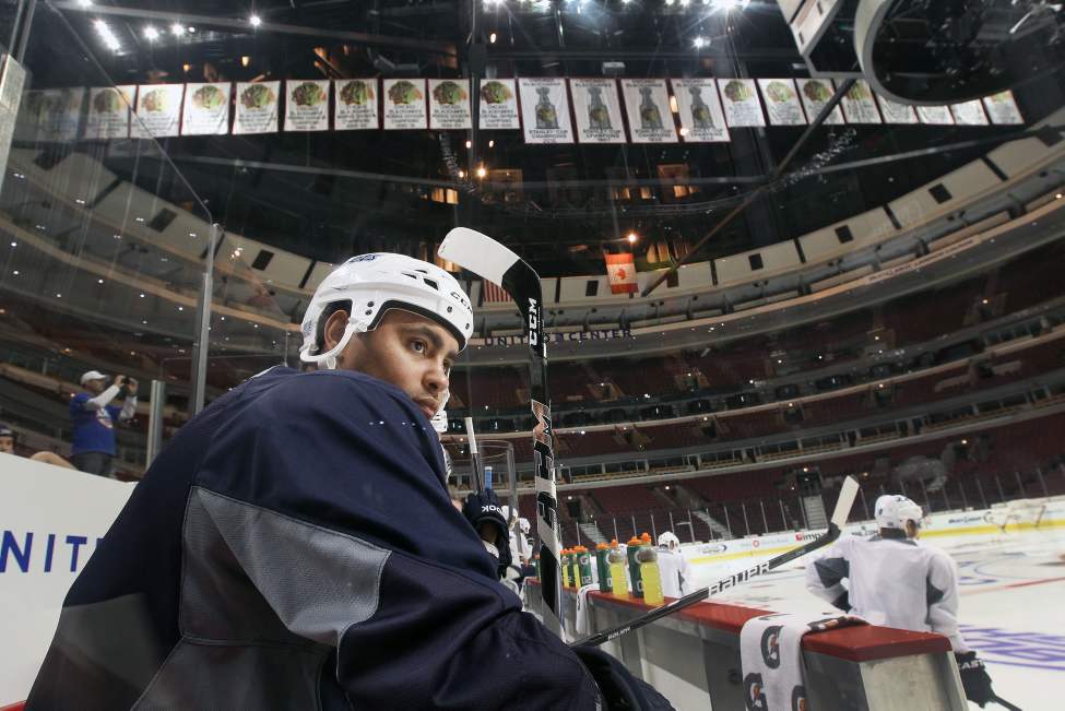 Dustin Byfuglien takes in the view of his former home as a NHL player. (Joe Bryksa / Winnipeg Free Press)