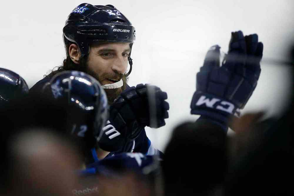 JOHN WOODS / WINNIPEG FREE PRESS
Winnipeg Jets' Chris Thorburn (22) celebrates his breakaway goal on Minnesota Wild's goaltender Devan Dubnyk (40) during second period NHL action in Winnipeg.