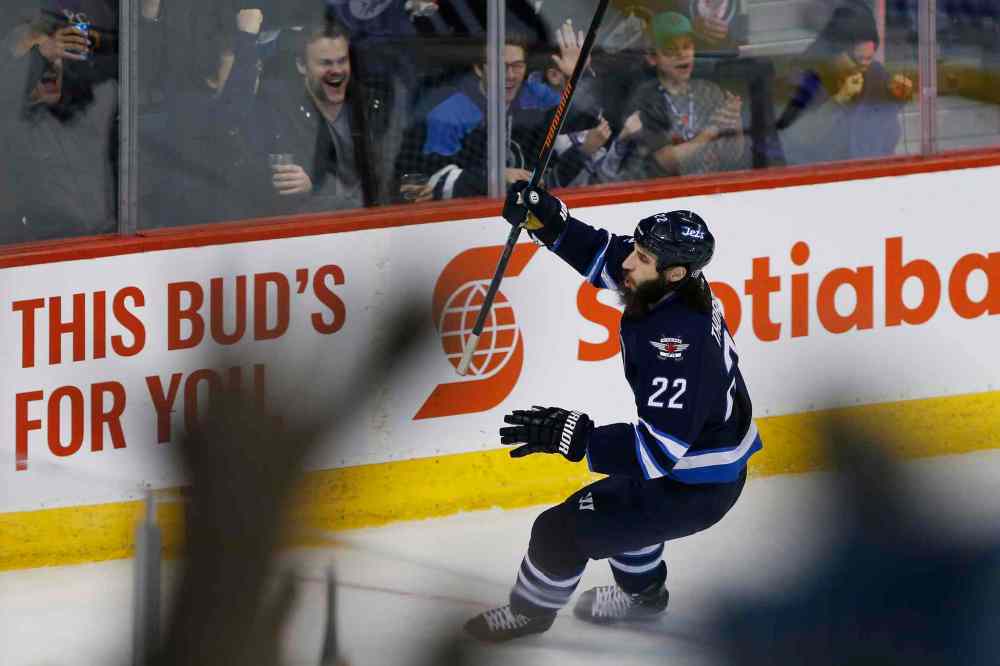 JOHN WOODS / WINNIPEG FREE PRESS
Winnipeg Jets' Chris Thorburn (22) celebrates his breakaway goal on Minnesota Wild's goaltender Devan Dubnyk (40) during second period.