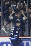John Woods / WINNIPEG FREE PRESS
Winnipeg Jets' Mark Scheifele (55) and fans celebrate his first-period goal against the San Jose Sharks.