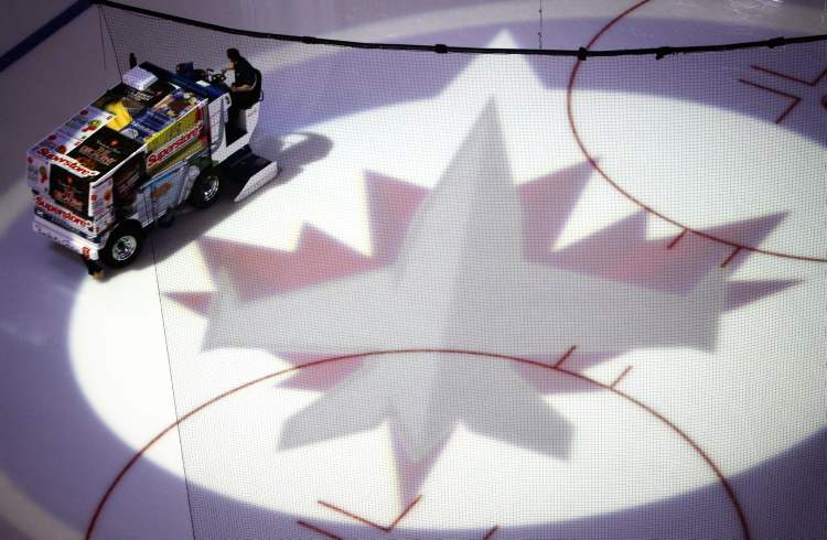 TREVOR HAGAN / WINNIPEG FREE PRESS
The ice cleaner prepares the ice prior to the first Jets game of the season against the Ottawa Senators at MTS Centre, Saturday 19, January, 2013.
