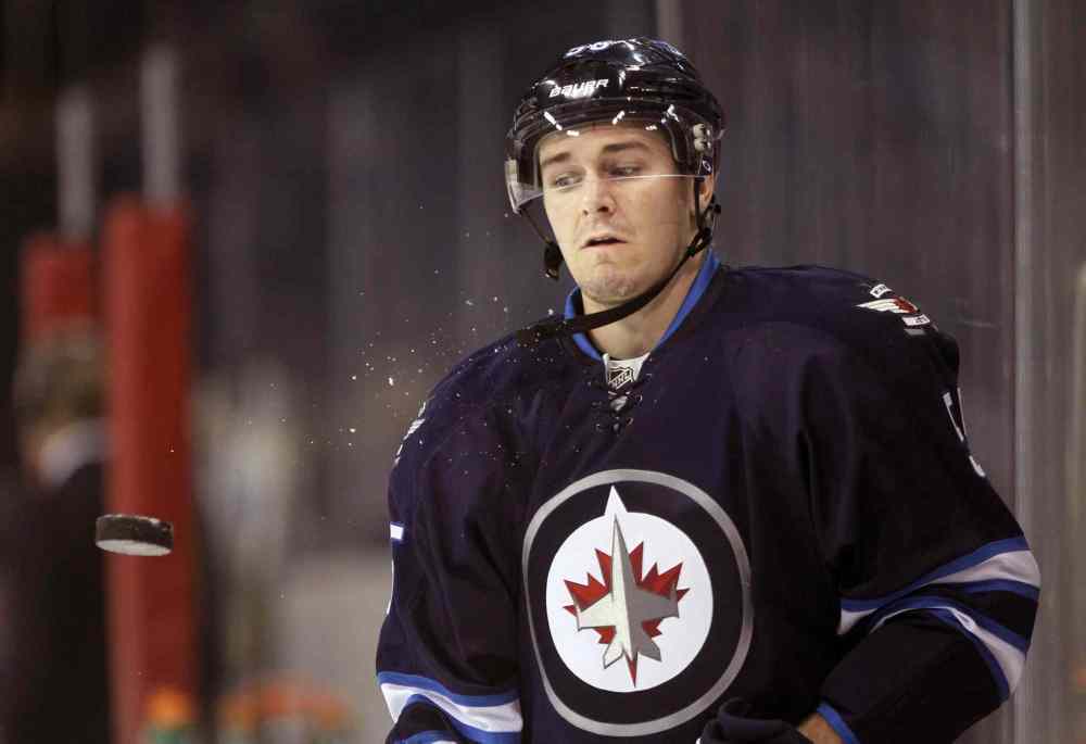 Joe Bryksa / Winnipeg Free Press
Winnipeg Jets Mark Scheifele watches the puck fly by him in he warmup before they play Tampa Bay Lightning at the MTS Centre tonight.