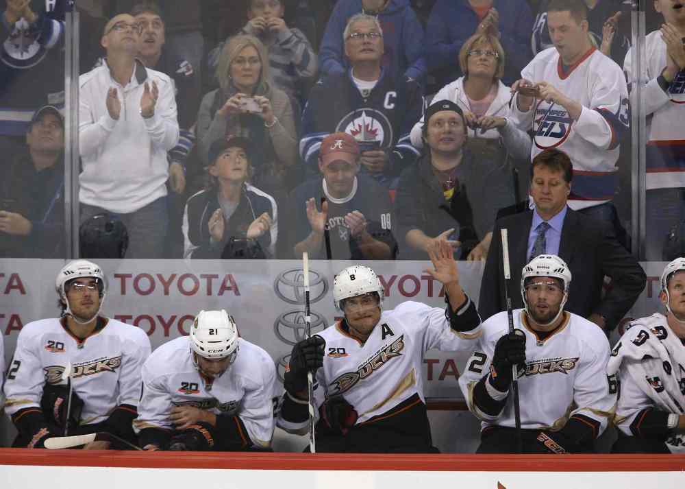 TREVOR HAGAN / THE CANADIAN PRESS
Anaheim Ducks' Teemu Selanne waves to fans as they salute him during the first period. Selanne, of course, used to thrill fans as a member of the Jets.