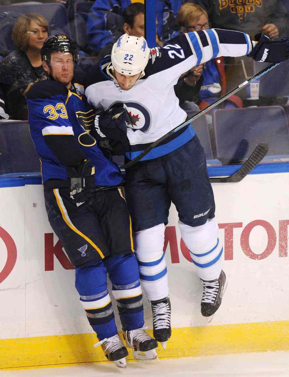 Bill Boyce / the associated press
St. Louis Blues' Jordan Leopold collides along the boards Winnipeg Jets' Chris Thorburn during the second period.