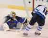 Bill Boyce / the associated press
St. Louis Blues goalie Jaroslav Halak can't block a goal by Winnipeg Jets forward Bryan Little during the third period of an NHL game in St. Louis Tuesday. The Blues won 3-2.