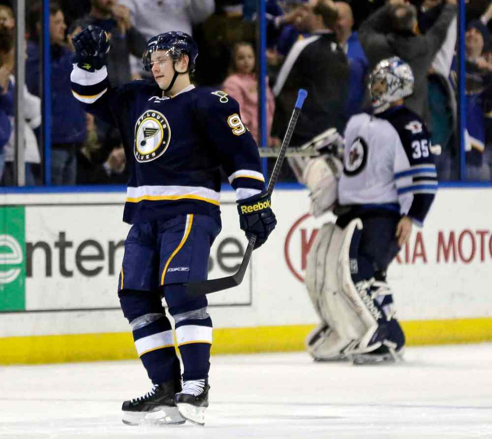 Jeff Roberson / The Associated Press
St. Louis Blues' Vladimir Tarasenko celebrates after scoring the final goal of a shootout as Winnipeg Jets' goalie Al Montoya skates off the ice following Saturday's game in St. Louis.