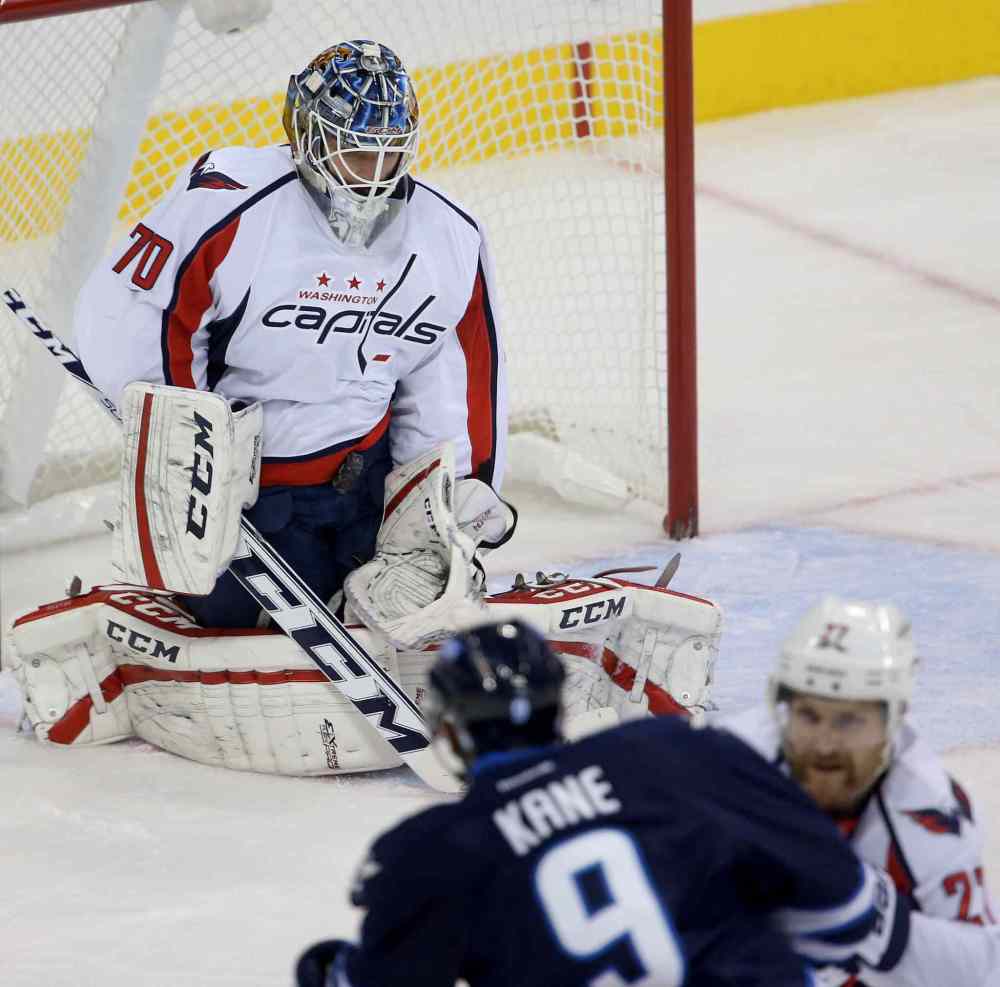 TREVOR HAGAN / THE CANADIAN PRESS
Washington Capitals goaltender Braden Holtby stops a shot by Winnipeg Jets forward Evander Kane in the first period.