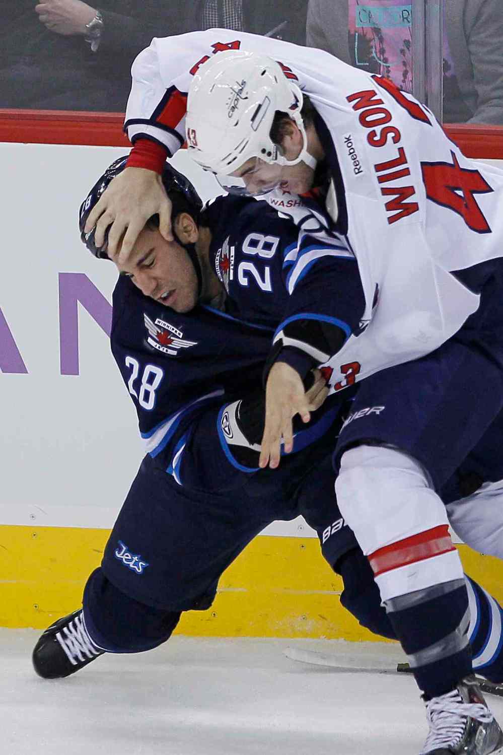 WINNIPEG FREE PRESS
Winnipeg Jets' Patrice Cormier (28) and Washington Capitals' Tom Wilson mix it up during the first period.