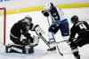 Jae C. Hong / The Associated Press
Winnipeg Jets' Andrew Ladd (16) tries to score against Anaheim Ducks' goalie Jonas Hiller, left, as the Ducks' Cam Fowler defends during first period in Anaheim Tuesday.