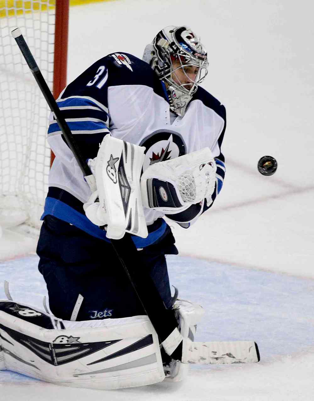 Jae C. Hong / The Associated Press
Winnipeg Jets' goalie Ondrej Pavelec makes a second-period save against the Anaheim Ducks Tuesday.