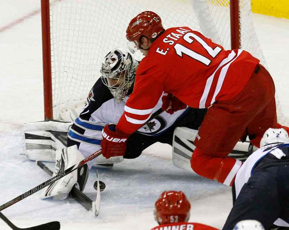 Chris Seward / Raleigh News & Observer/ Tribune Media MCT
Carolina Hurricanes' Eric Staal (12) can't score against Winnipeg Jets' Ondrej Pavelec (31) during the second period at the PNC Arena in Raleigh, N.C., on Tuesday.
