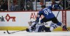 David Zalubowski / The Associated Press 
Winnipeg Jets defenceman Jacob Trouba, left, reaches out to clear puck out of the Jets' zone after being knocked down by Colorado Avalanche centre Ryan O'Reilly in the first period in Denver on Thursday.