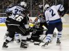 Kevork Djansezian / The Associated Press 
Los Angeles Kings goalie Jonathan Quick blocks a shoot on goal by Winnipeg Jets defenseman Adam Pardy, right, during the first period of the game Saturday in Los Angeles.