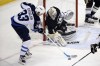Gene J. Puskar / The Associated Press 
Winnipeg Jets' Dustin Byfuglien (33) can't get a shot off in front of Pittsburgh Penguins goalie Thomas Greiss during the first period in Pittsburgh Tuesday.