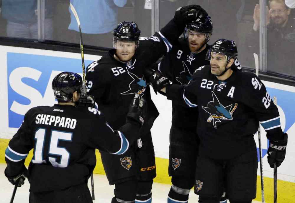 Marcio Jose Sanchez / The Associated Press
San Jose Sharks' Dan Boyle (22), celebrates his goal against the Winnipeg Jets with teammates Martin Havlat (9), Matt Irwin (52) and James Sheppard (15) during the first period on Thursday, March 27 in San Jose, Calif.