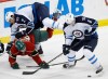 Ann Heisenfelt / The Associated Press
Minnesota Wild center Tyler Graovac (53) battles Winnipeg Jets defensemen Adam Pardy (2) and Jacob Trouba (8) for the puck during the first period of an NHL preseason hockey game in St. Paul, Minn., Sunday. (Ann Heisenfelt / The Associated Press)