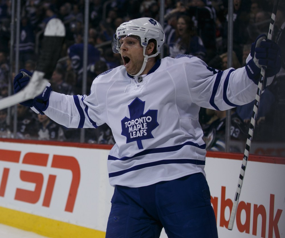Melissa Tait / Winnipeg Free Press
Leafs' forward Phil Kessel celebrates his game-tying goal in the third period against the Jets at MTS Centre Saturday night. The Jets won in overtime 5-4.