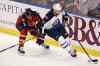 J Pat Carter / The Associated Press
Florida Panthers' Steven Kampfer (3) and Winnipeg Jets' Anthony Peluso (17) fight for the puck during the first period of Thursday's game.