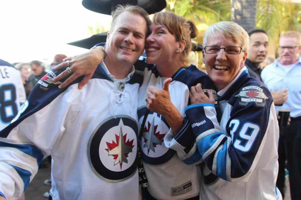 Jeff Hamilton / Winnipeg Free Press
Ryan McGee (from left), Gail Campbell and Trish Jordan are all smiles in Sunny Anaheim ahead of Game 1 between the Winnipeg Jets and the Anaheim Ducks Thursday.
