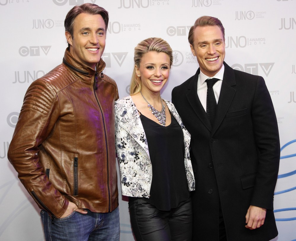 Joe Bryksa/ Winnipeg Free Press
CTV's eTalk hosts Ben Mulroney, Danielle McGimsie and Devon Soltendieck arrive on the Junos 2014 red carpet.
(Joe Bryksa/ Winnipeg Free Press)