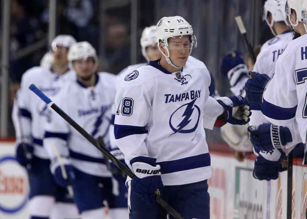 Trevor Hagan / The Canadian Press
Tampa Bay Lightning's Ondrej Palat (18) celebrates his second period goal against the Winnipeg Jets.
